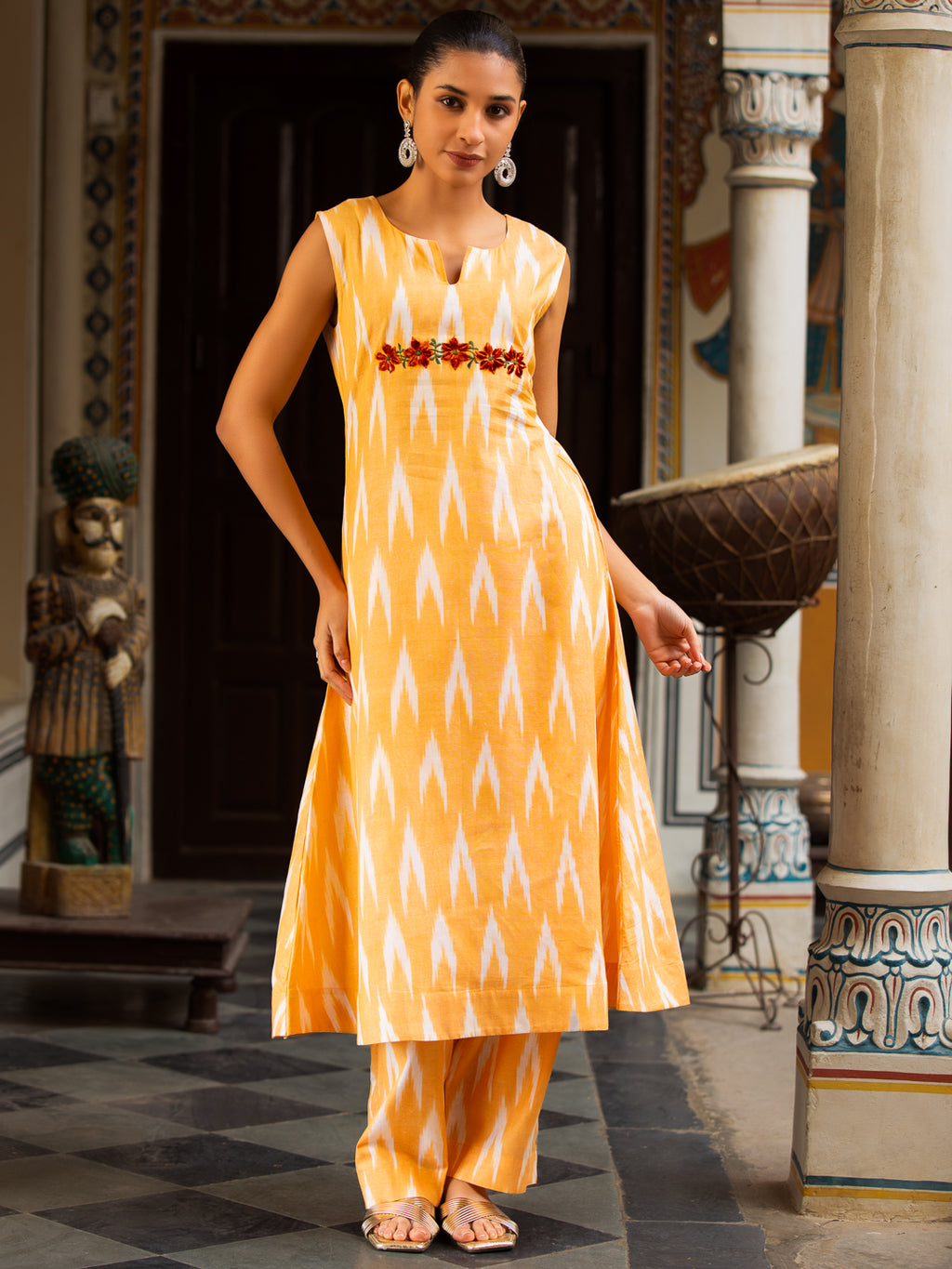 Ikkat Print Sleeveless Round-Neck Embroidered Kurta with Side Pockets & Palazzo Set Yellow